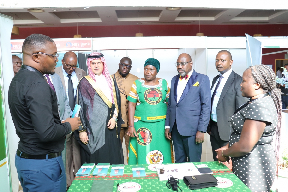 Minister of Mining Hon. Monica Chang&#039;anamuno and other delegates at the EDF pavilion