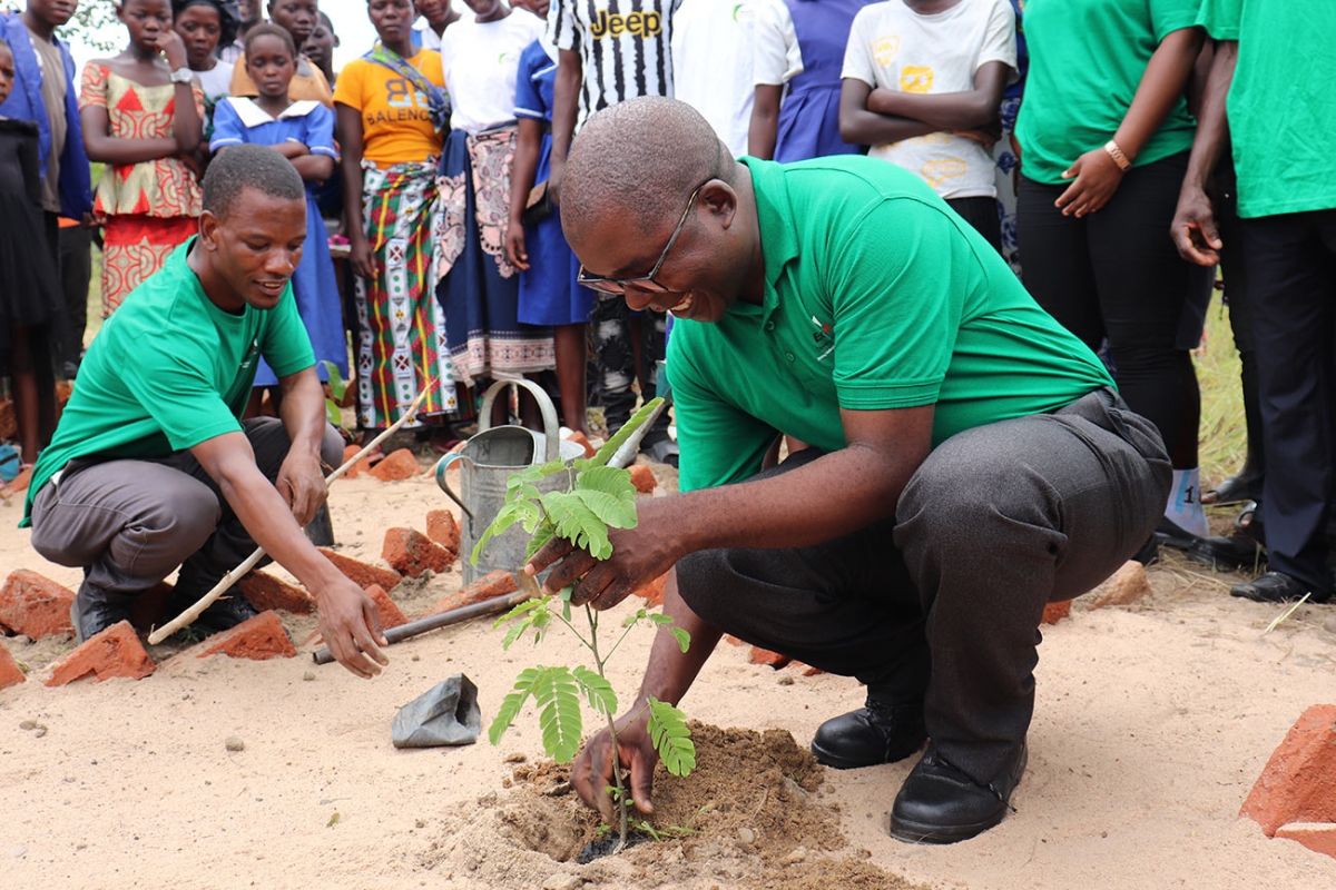 Moffat Musukwa, EDF Chief Finance Officer leading the tree planting exercise